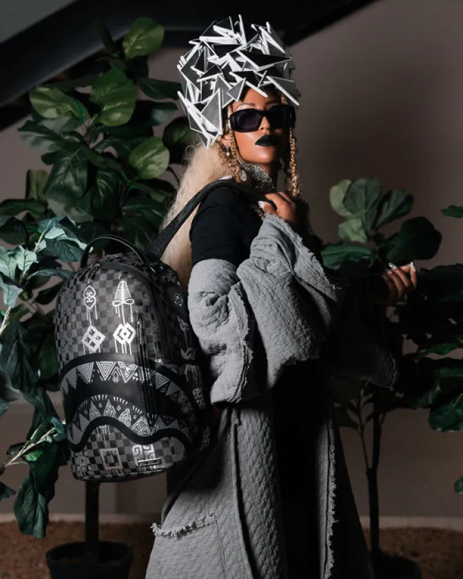 AFRICAN INTELLIGENCE 9 POWER GLYPHICS BACKPACK - SANDFLOWER COLLAB