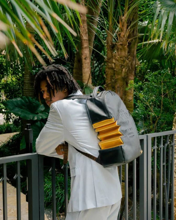 A.i.3 SHARK BITE BLACK GOLD BACKPACK (DLXV)