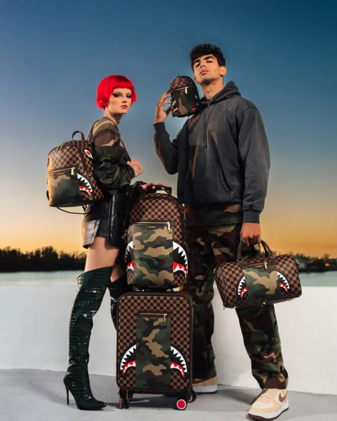 EXTERIOR GOLD ZIP POCKET SHARKS IN PARIS BACKPACK SLING